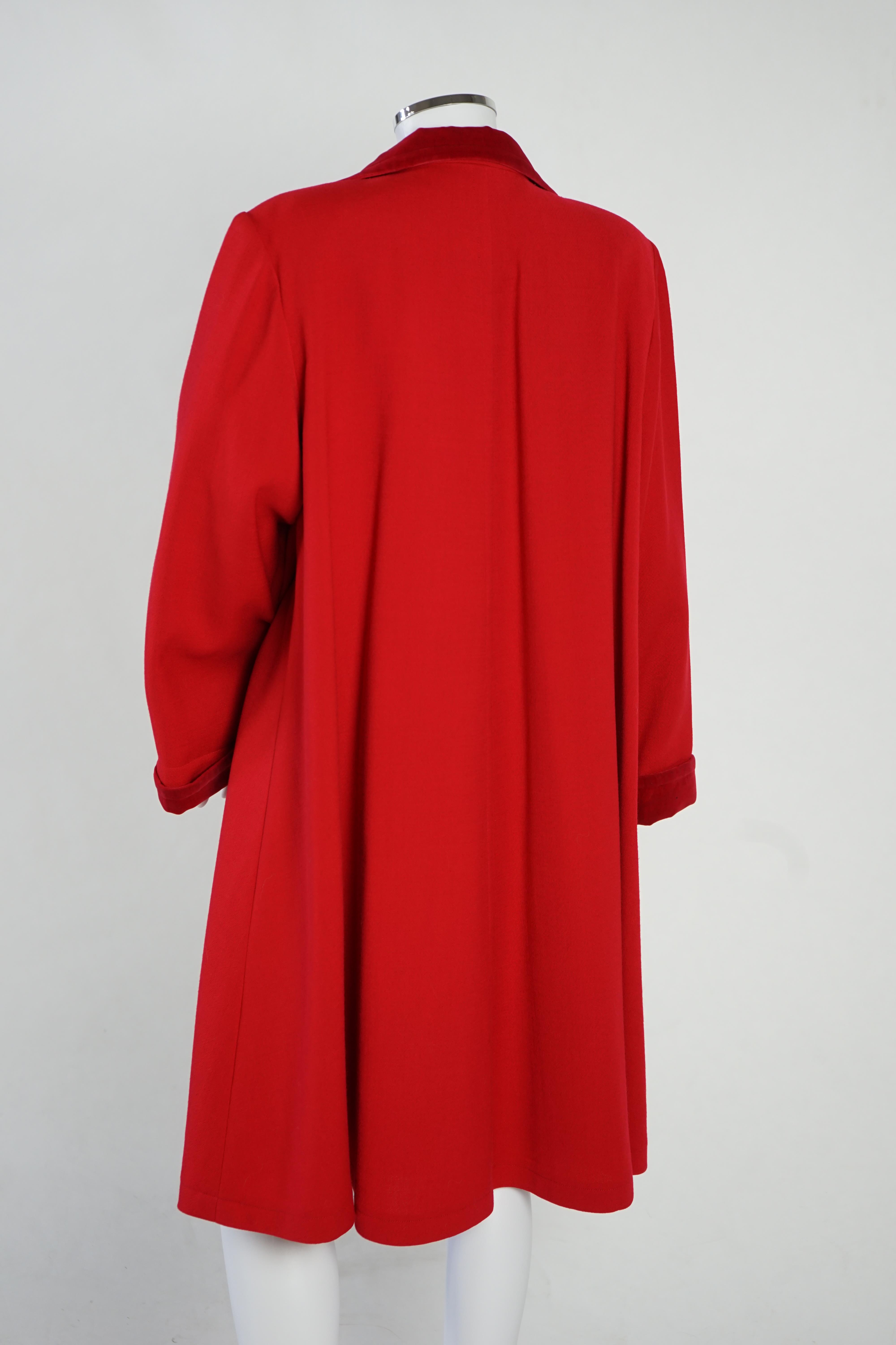 A vintage Yves Saint Laurent variation lady's red wool coat with velvet trim, F 40 (UK 12). Proceeds to Happy Paws Puppy Rescue
